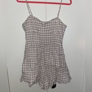 New with Tags Gingham Romper with Adjustable Straps!